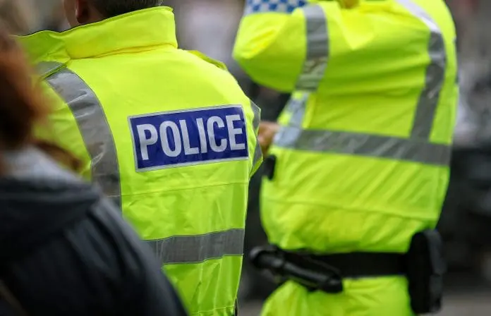 Police,Officers,In,Hi-visibility,Jacket,Policing,Crowd,Control,At,An