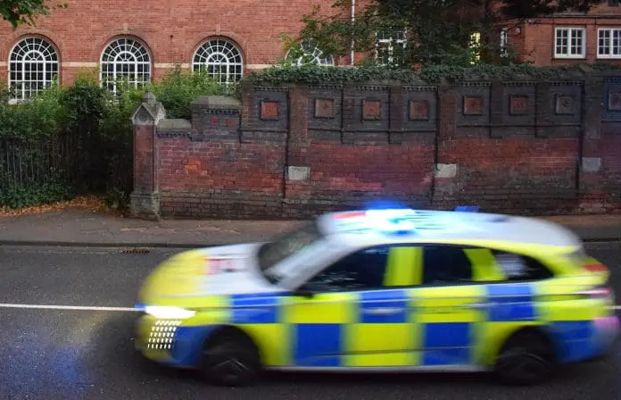 St.,Albans,,Uksep,22,,2025:,Motion-blurred,British,Police,Car,With