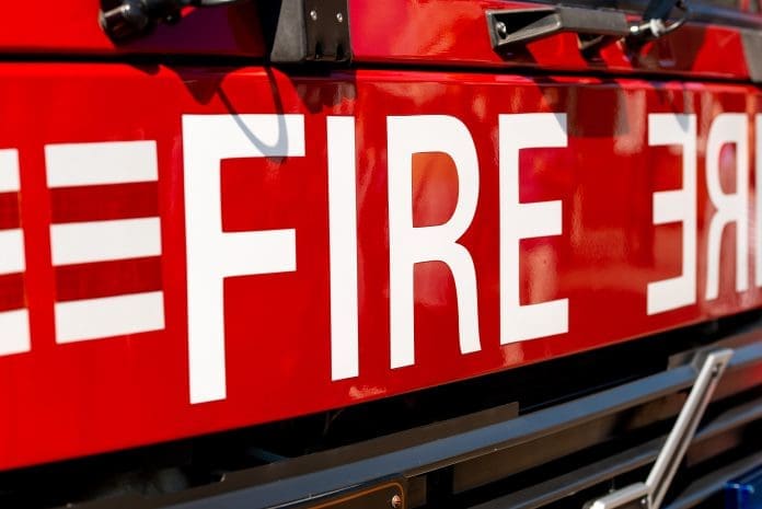 Close,Up,Of,Fire,Sign,On,The,Front,Of,A